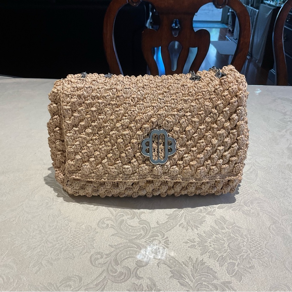 Straw bag with silver strap